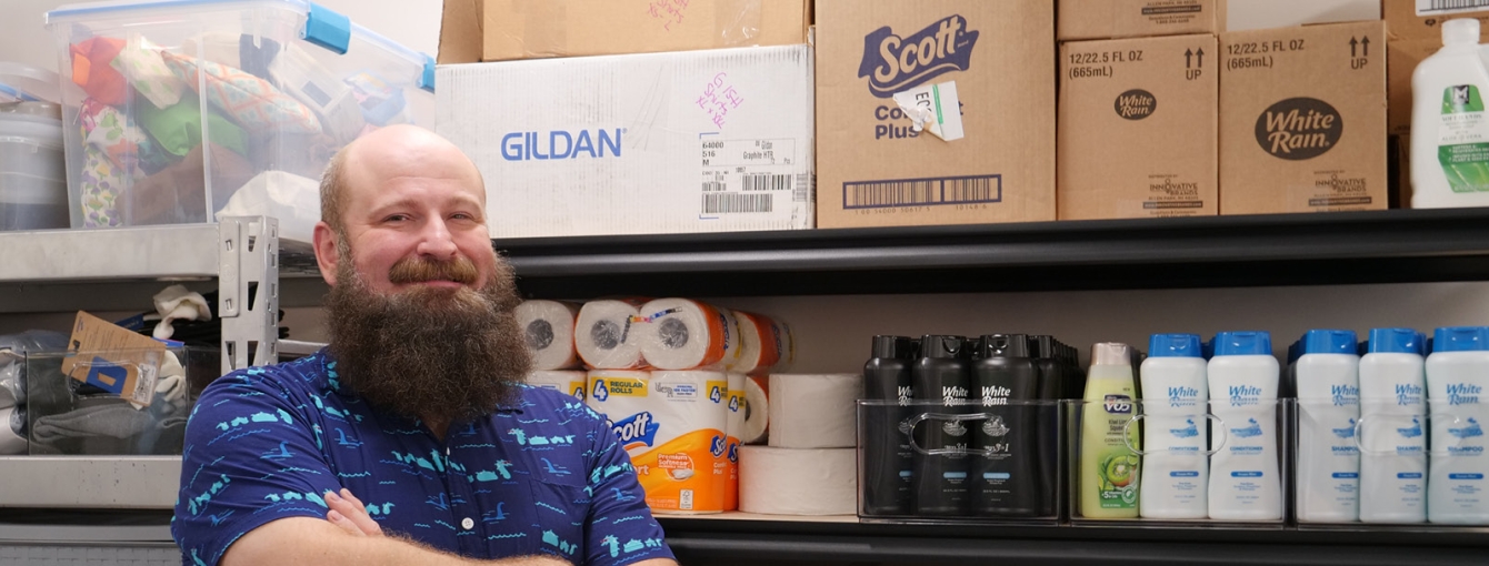 Brian Whitecalf stands in Room 108, home to the Grand Island Archipelago Program